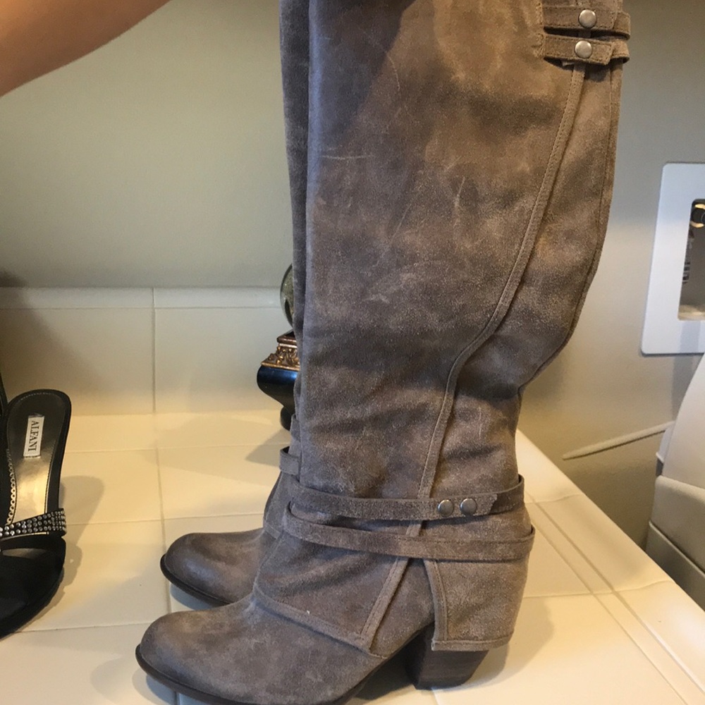 Taupe colored below the knee Fergie boots